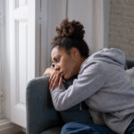 Sad black woman suffering from depression symptoms feeling distr